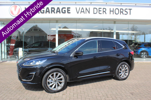 Ford Kuga 2.5-225pk PHEV 'Vignale' Plug-in Hybrid Automaat. Luxe hybride rijden voor een reëel bedrag ! Adaptieve Cruise Control, Climate Control, Stoel-, stuur-, voorraam- en achterbankverwarming, Side- en lane assist, Camera, Head-up display etc.