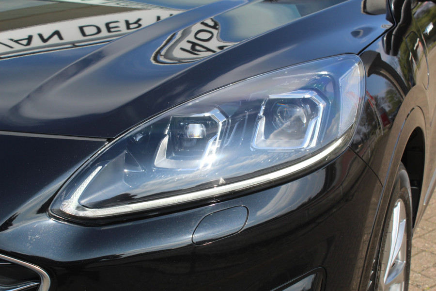 Ford Kuga 2.5-225pk PHEV 'Vignale' Plug-in Hybrid Automaat. Luxe hybride rijden voor een reëel bedrag ! Adaptieve Cruise Control, Climate Control, Stoel-, stuur-, voorraam- en achterbankverwarming, Side- en lane assist, Camera, Head-up display etc.