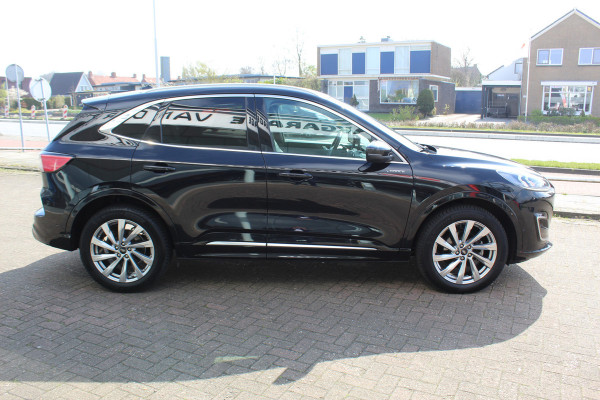 Ford Kuga 2.5-225pk PHEV 'Vignale' Plug-in Hybrid Automaat. Luxe hybride rijden voor een reëel bedrag ! Adaptieve Cruise Control, Climate Control, Stoel-, stuur-, voorraam- en achterbankverwarming, Side- en lane assist, Camera, Head-up display etc.