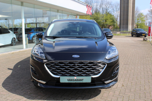 Ford Kuga 2.5-225pk PHEV 'Vignale' Plug-in Hybrid Automaat. Luxe hybride rijden voor een reëel bedrag ! Adaptieve Cruise Control, Climate Control, Stoel-, stuur-, voorraam- en achterbankverwarming, Side- en lane assist, Camera, Head-up display etc.
