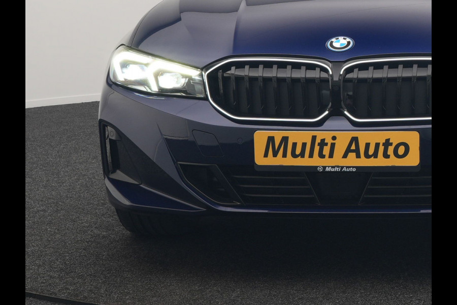 BMW 3 Serie Touring 320e xDrive PHEV 204pk Dealer O.H. | Trekhaak Af Fabriek | Panodak | Adaptive Cruise | Camera | Lederen Sportstoelen Memory & Verwarmd | Widescreen Navi | Blis | Apple Carplay | DAB | Iconic Glow Grille | Plug In Hybrid |