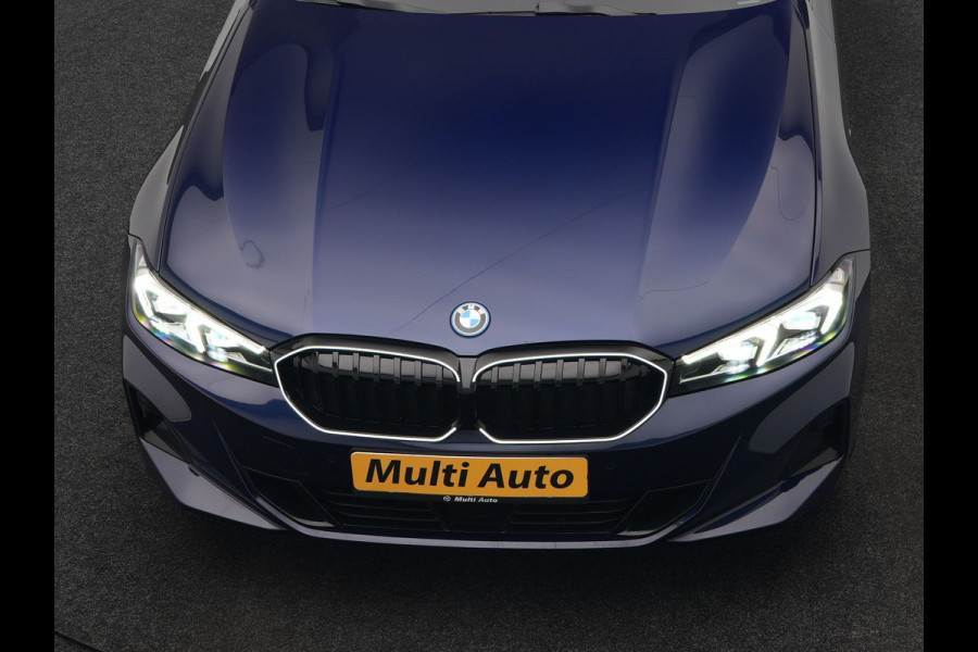 BMW 3 Serie Touring 320e xDrive PHEV 204pk Dealer O.H. | Trekhaak Af Fabriek | Panodak | Adaptive Cruise | Camera | Lederen Sportstoelen Memory & Verwarmd | Widescreen Navi | Blis | Apple Carplay | DAB | Iconic Glow Grille | Plug In Hybrid |