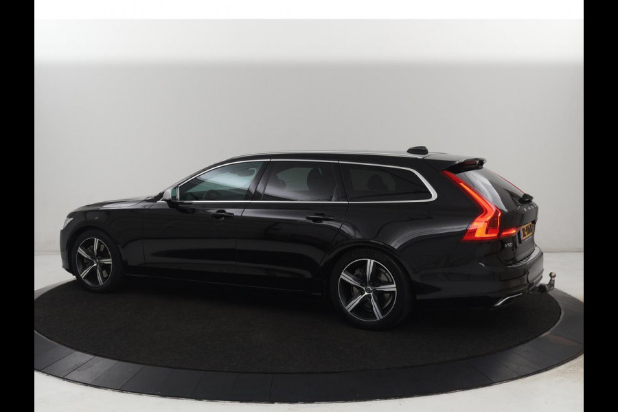 Volvo V90 2.0 T4 R-Design | Trekhaak | Leder/Alcantara | Stoelverwarming | Adaptive cruise | Camera | Carplay | Keyless | Side Assist | Navigatie | Climate control | Sportstoelen | Getint glas