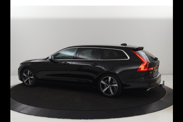 Volvo V90 2.0 T4 R-Design | Trekhaak | Leder/Alcantara | Stoelverwarming | Adaptive cruise | Camera | Carplay | Keyless | Side Assist | Navigatie | Climate control | Sportstoelen | Getint glas