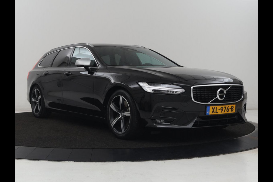 Volvo V90 2.0 T4 R-Design | Trekhaak | Leder/Alcantara | Stoelverwarming | Adaptive cruise | Camera | Carplay | Keyless | Side Assist | Navigatie | Climate control | Sportstoelen | Getint glas