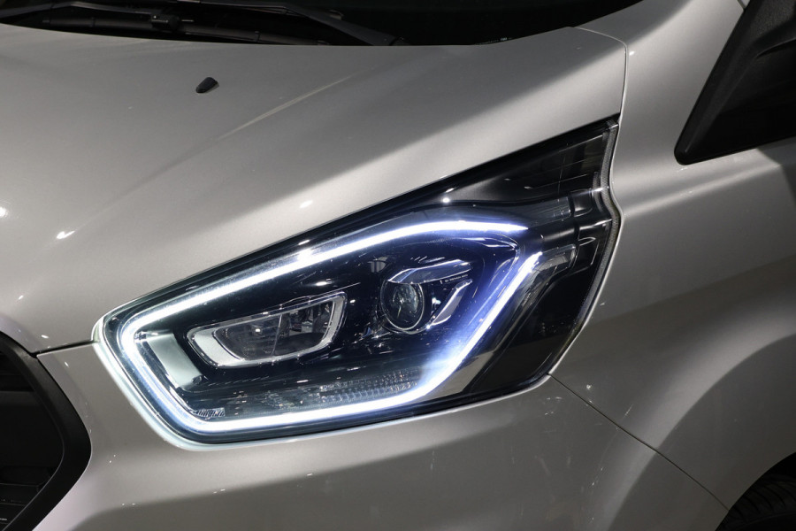 Ford Transit Custom 320 2.0 TDCI DC L2H1 Platinum Edition | Dubbel Cabine | Bi-Xenon | CarPlay | Navigatie | Lederen bekleding | Camera | Dodehoek d | Trekhaak | Nieuwe APK | NAP Logisch