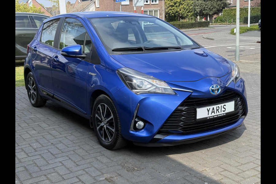 Toyota Yaris 1.5 Full Hybrid Dynamic | Lichtmetalen velgen, Parkeercamera, Licht + Regensensor, Cruise control, Climate control