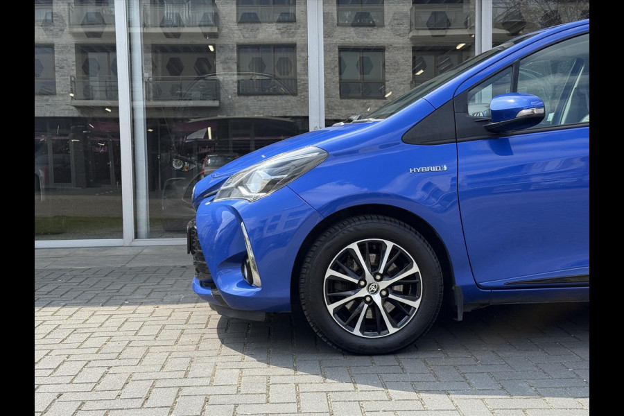 Toyota Yaris 1.5 Full Hybrid Dynamic | Lichtmetalen velgen, Parkeercamera, Licht + Regensensor, Cruise control, Climate control
