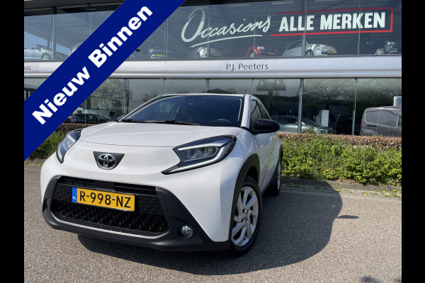 Toyota Aygo X 1.0 VVT-i MT first Achteruitrijcamera - Airco - Apple carplay - Bluetooth - Cruise control - Led verlichting -  Licht metalen velgen 17 inch - Radio - Mistlampen - Stuur multifunctioneel - Stuur leder - Elektrische ramen voor - Regensensor - Start/stop systeem