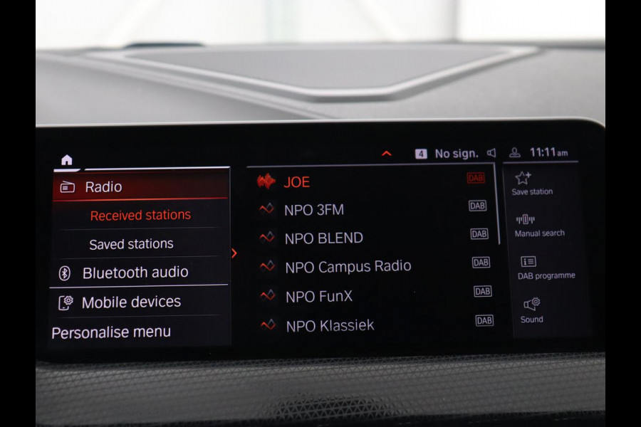 BMW 1-serie 118i Sport Line | Sportstoelen | Carplay | Half leder | Live Cockpit | Full LED | Navigatie | Sfeerverlichting | Trekhaak | Climate control | Parkeerhulp | Cruise control | DAB | Bluetooth