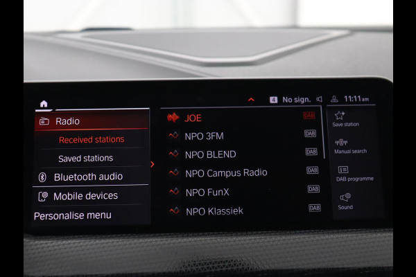 BMW 1-serie 118i Sport Line | Sportstoelen | Carplay | Half leder | Live Cockpit | Full LED | Navigatie | Sfeerverlichting | Trekhaak | Climate control | Parkeerhulp | Cruise control | DAB | Bluetooth