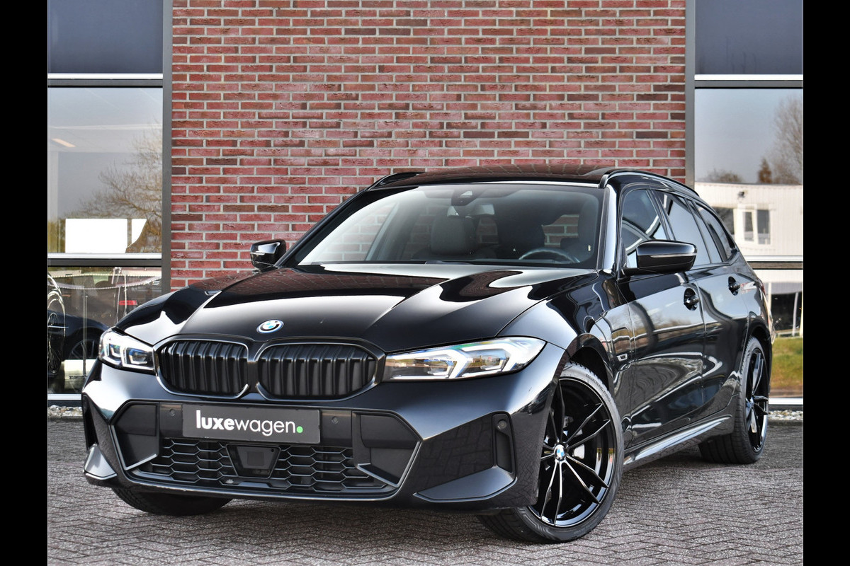 BMW 3 Serie Touring 330e M-Sport Pano ACC Trekhaak H/K HUD 19inch Stuurverw