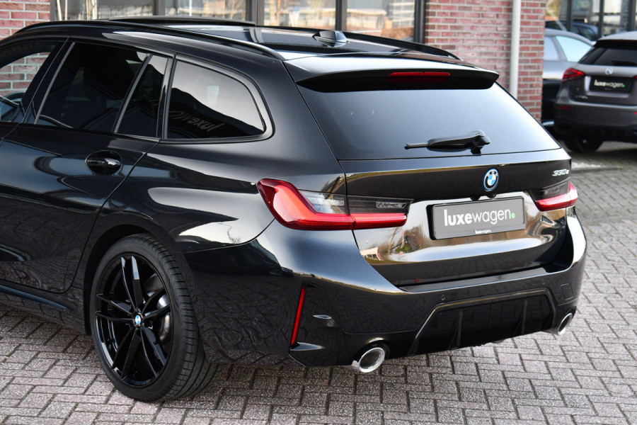 BMW 3 Serie Touring 330e M-Sport Pano ACC Trekhaak H/K HUD 19inch Stuurverw