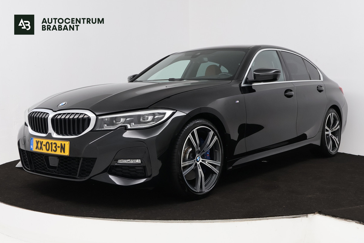BMW 3-serie 330i High Executive Edition (STOELVERWARMING, SFEERVERLICHTING, ACHTERUITRIJCAMERA, NAVIGATIE, PARKEERSENSOREN)