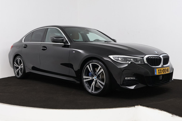 BMW 3-serie 330i High Executive Edition (STOELVERWARMING, SFEERVERLICHTING, ACHTERUITRIJCAMERA, NAVIGATIE, PARKEERSENSOREN)