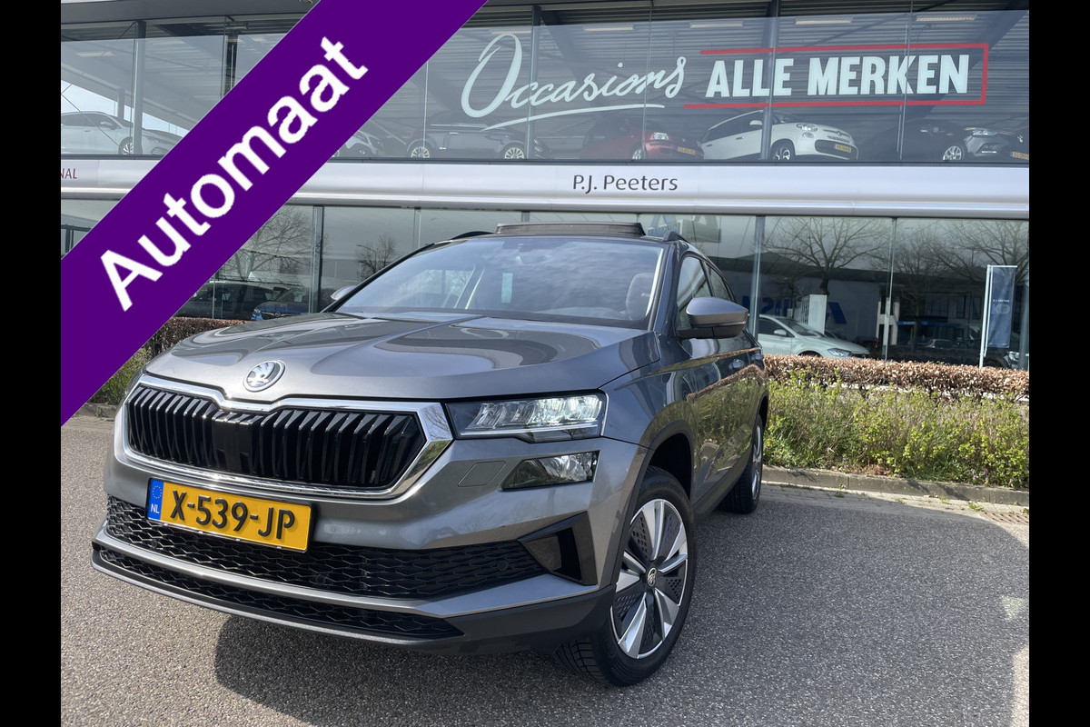 Škoda Karoq 1.5 TSI ACT Business Edition Plus Schuif/kanteldak - Achteruitrijcamera - Elektrische trekhaak stuurverwarming- Stoelverwarming - Parkeersensoren - Airco - Apple carplay - Navigatiesysteem - Achterspoiler - Stuur multifunctio Licht metalen velgen 17 inch - Bluetooth - Cruise control - Dakrails - Extra getint glas - Keyless entry/start - Led verlichting - Start/stop systeem - Elektrische ramen - Led verlichting