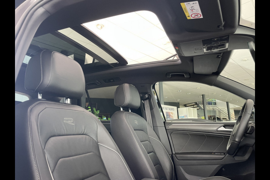 Volkswagen Tiguan 1.5 TSI 2x R-line Achteruitrijcamera - Virtual dashboard - Apple carplay - Navigatie - Parkeersensoren - Licht metalen velgen 20 inch - Mistlampen - Dakrails - IQ light - Hill hold functie - Radio - Extra getint glas - Lederen bekleding - Stuur multifunctioneel - Stoelverwarming - stuurverwarming - Regensensor - Bluetooth