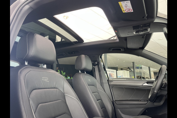 Volkswagen Tiguan 1.5 TSI 2x R-line Achteruitrijcamera - Virtual dashboard - Apple carplay - Navigatie - Parkeersensoren - Licht metalen velgen 20 inch - Mistlampen - Dakrails - IQ light - Hill hold functie - Radio - Extra getint glas - Lederen bekleding - Stuur multifunctioneel - Stoelverwarming - stuurverwarming - Regensensor - Bluetooth