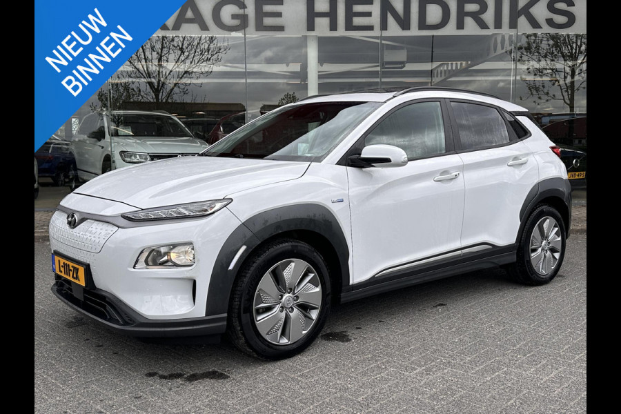 Hyundai Kona EV Fashion 64 kWh | SOH: 96,8% | Sky PANO Dak | HUD | Dodehoek Detectie | ACC |