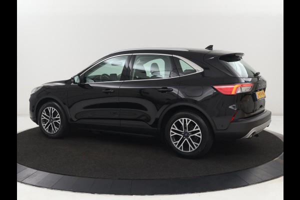 Ford Kuga 2.5 PHEV Titanium | SOH 91,5% | Trekhaak | Stoelverwarming | Adaptive cruise | Camera | Caplay | Navigatie | Dodehoek detectie | Keyless | Digital Cockpit | Achterbankverwarming | Plug In