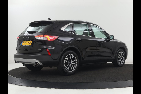Ford Kuga 2.5 PHEV Titanium | SOH 91,5% | Trekhaak | Stoelverwarming | Adaptive cruise | Camera | Caplay | Navigatie | Dodehoek detectie | Keyless | Digital Cockpit | Achterbankverwarming | Plug In