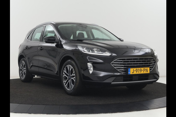 Ford Kuga 2.5 PHEV Titanium | SOH 91,5% | Trekhaak | Stoelverwarming | Adaptive cruise | Camera | Caplay | Navigatie | Dodehoek detectie | Keyless | Digital Cockpit | Achterbankverwarming | Plug In