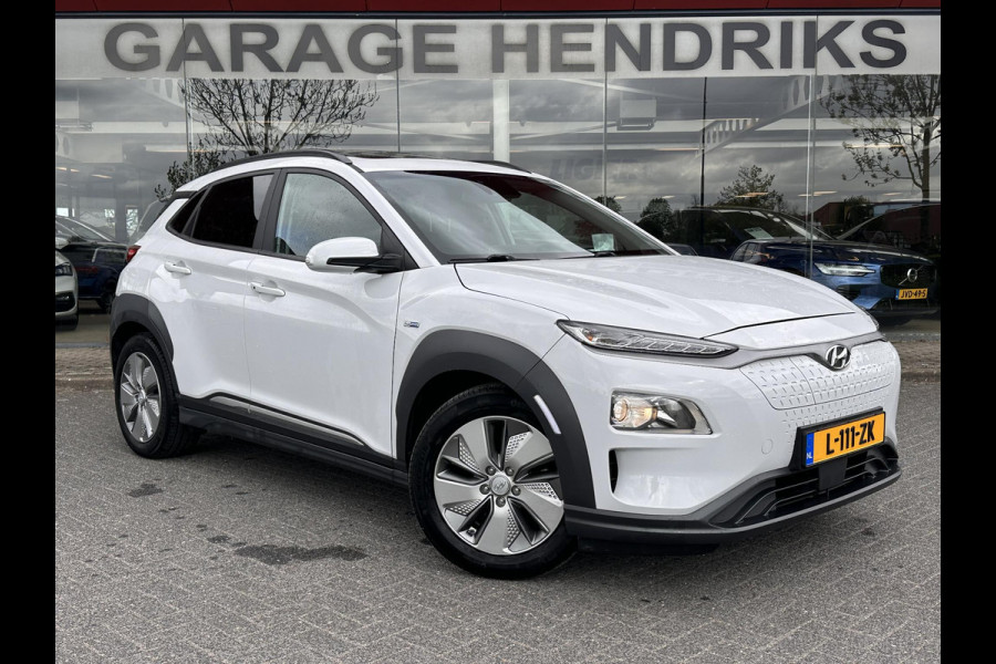 Hyundai Kona EV Fashion 64 kWh | SOH: 96,8% | Sky PANO Dak | HUD | Dodehoek Detectie | ACC |