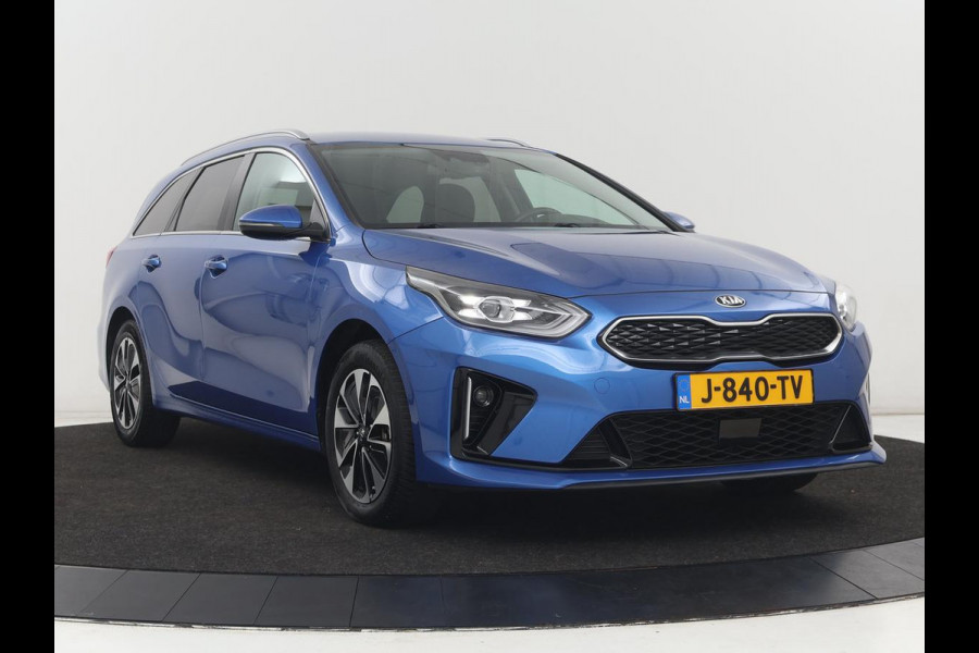 Kia Ceed 1.6 GDI PHEV DynamicPlusLine | SOH 100% | Stoel & stuurverwarming | Trekhaak | Half leder | Carplay | Camera | Keyless | Full LED | Navigatie | Adaptive cruise | Climate control | Bluetooth | Plug In