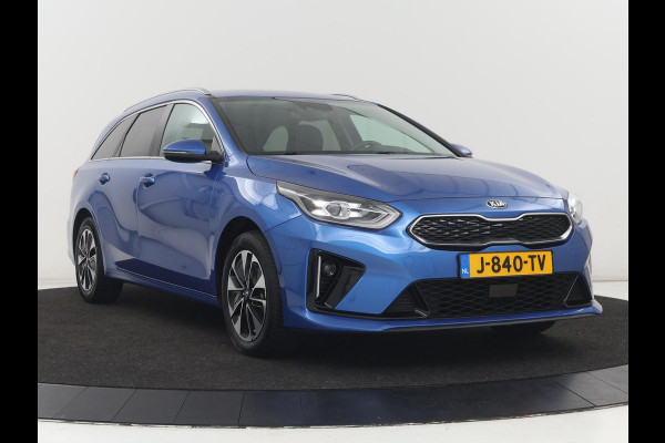Kia Ceed 1.6 GDI PHEV DynamicPlusLine | SOH 100% | Stoel & stuurverwarming | Trekhaak | Half leder | Carplay | Camera | Keyless | Full LED | Navigatie | Adaptive cruise | Climate control | Bluetooth | Plug In