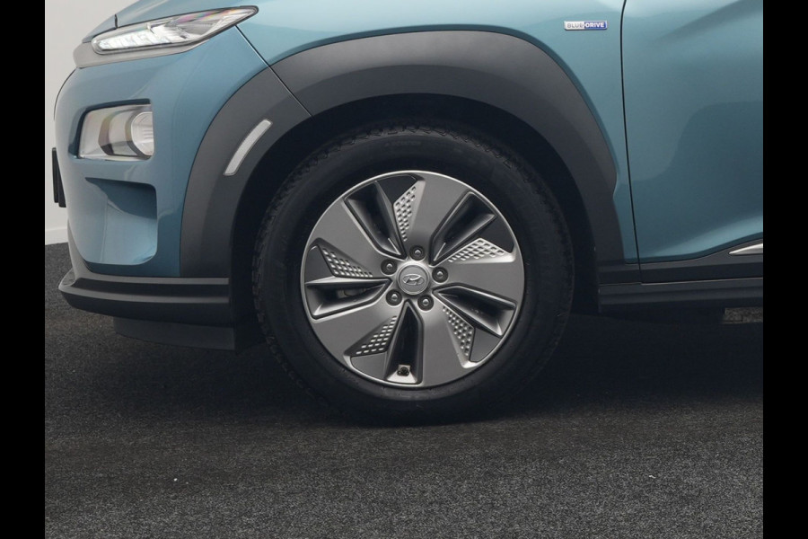 Hyundai Kona EV Fashion 64 kWh 204pk Dealer O.H. | Adaptive Cruise | Camera | Sportstoelen & Stuur Verwarmd | Krell Audio | Keyless | Apple Carplay | Navigatie | DAB |