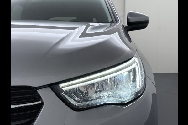 Opel Grandland X 1.2T 131PK Trekhaak Navi Ecc Pdc Apple Carplay Android Auto Cruise Control Edition Lmv Licht-Regensensor Verkeersbordherkenning PrivacyGlas IntelliLink Bluetooth Origineel Nederlandse Auto 1.400KG Trekgewicht! Bij ons volledig Onderhouden