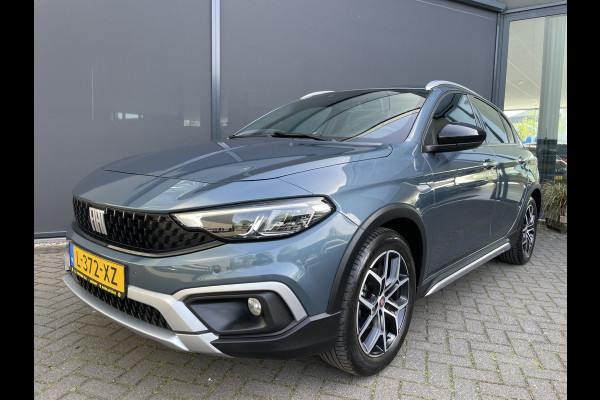 Fiat Tipo Cross 1.0 Cross Airco - Achteruitrijcamera - Parkeersensoren - Navigatie - Stoelverwarming - U-connect - Licht metalen velgen 17 inch - Trekhaak afneembaar - Cruise control - Radio - Mistlampen - Bluetooth - Dakrails - Elektrische ramen - Extra getint glas achter - Led verlichting - Start/stop systeem - Nieuw bij ons geleverd