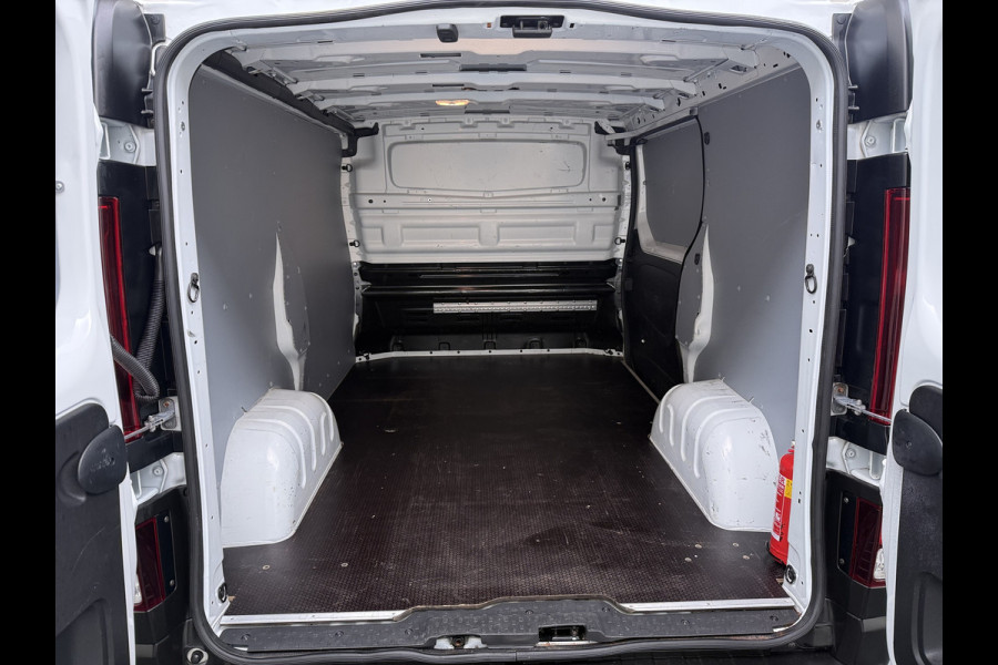 Renault Trafic 2.0dCi 120PK T29 L1H1 3-Persoons Trekhaak Euro 6 Apple Carplay Android Auto Airco Navi Cruise Control Led Bluetooth Pdc Betonplex Vloer Wandbetimmering Schuifdeur 1e Eigenaar Origineel Nederlandse Bus