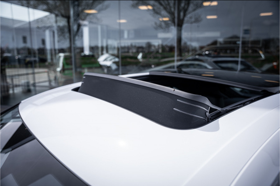 Porsche Macan 100 kWh ** Panodak ** 22inch ** BOSE ** Rijbereik 588km (WLTP) NL-auto ** NAP!!