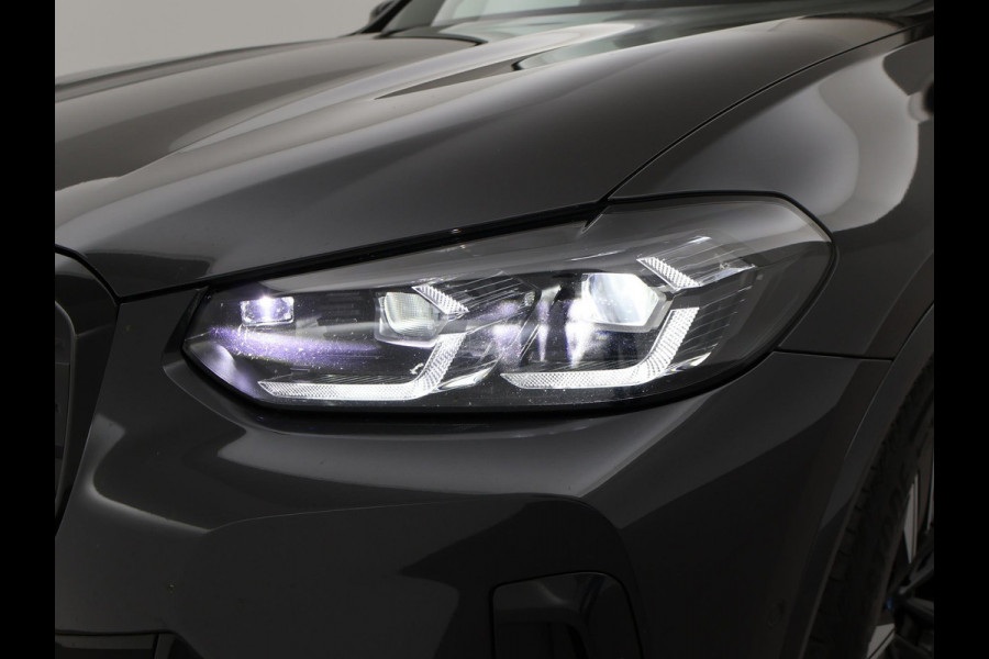 BMW iX3 80 kWh FACELIFT M-SPORT SOH 98,8% + TREKHAAK | SPORTSTOELEN LEDER | PANORAMA | ADAPTIVE CRUISE | MEMORY