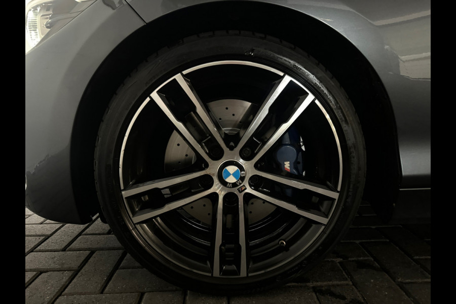 BMW 1-serie M140i xDrive Executive Harman Kardon|Volleder