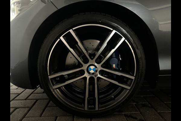 BMW 1-serie M140i xDrive Executive Harman Kardon|Volleder