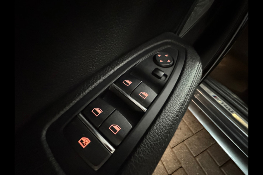 BMW 1-serie M140i xDrive Executive Harman Kardon|Volleder