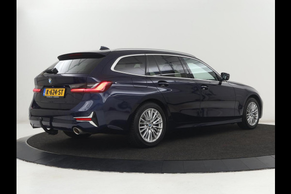 BMW 3 Serie 318i Luxury Line | Sportstoelen | Leder | Carplay | Live Cockpit | Sfeerverlichting | Trekhaak | Parkeerhulp | Climate control | Full LED | Cruise control | Bluetooth