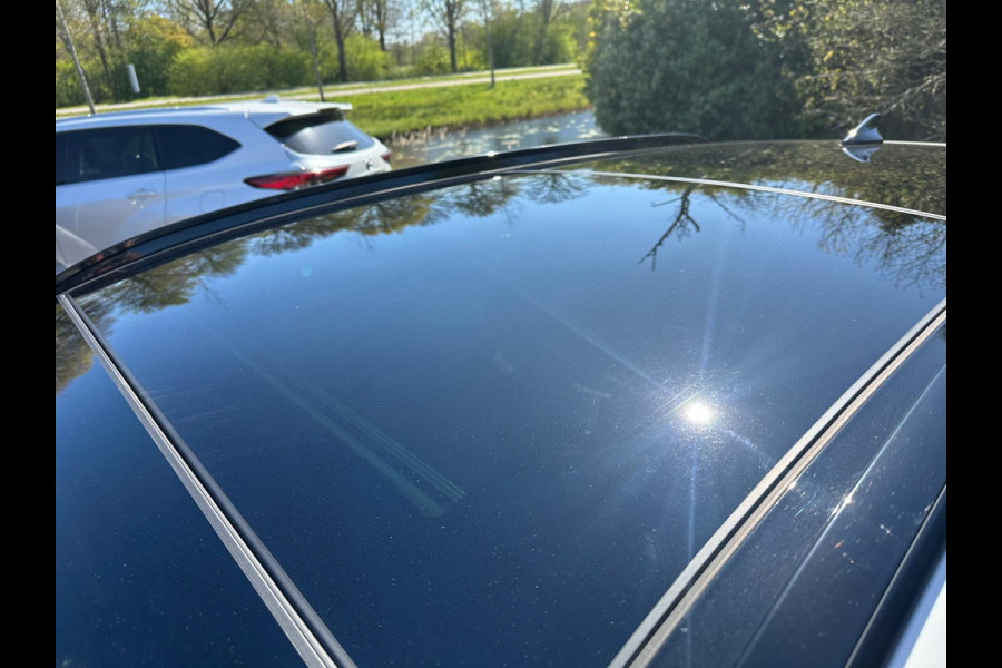Hyundai Tucson 1.6 T-GDI PHEV Premium Sky 4WD | Panoramadak | Dealer onderhouden | Leder | Achteruitrijcamera | Elek. klep | Stoelverwarming voor & achter