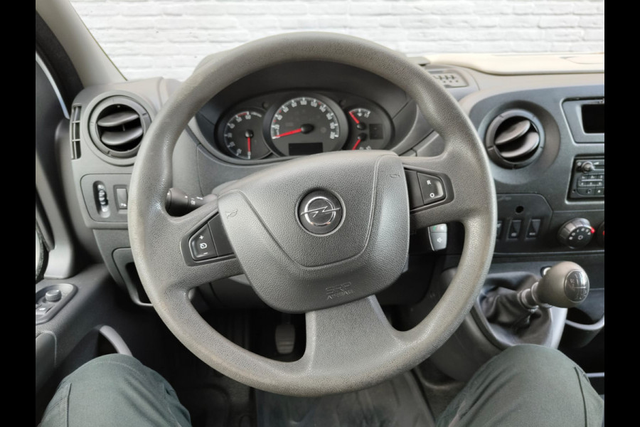 Opel Movano 2.3CDTI 146PK Bi-Turbo L2H2 3-Persoons Airco Cruise Trekhaak Pdc Schuifdeur ESP Bluetooth Betonplex Vloer Wandbetimmering EURO6 2.500KG Trekgewicht