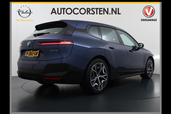 BMW iX xDrive40 326pk Soh 100% Leer-Suite+Massage+Ventilatie PanoDak Laser-LED 22"lm Wegklapb.-Trekhaak Soft-Close-aut. Adaptive-Cruise AWD Digital-Key Connected-Drive Android Apple CarplayWarmte-comfort-pack AchteruitRij-Assist Co-Pilot-Pack Drive-Assist Zwarte-Hemel 4WD Uitwijkassist Keyless Stuur+Bank+Stoel-Verwarmd DAB Orig.NLse auto 1e Eigenaar 2.500kg Trekvermogen (630Nm)!  € 106.000,- nieuw  Nét beurt gehad (163.340km)