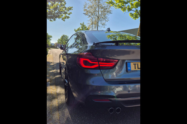 BMW 3-serie Gran Turismo GT M Sport OPTIES Panorama CarPlay Adaptieve Cruise Elek. Trekhaak Camera 2e Eigenaar 320i High Executive
