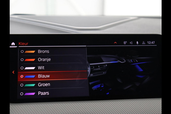 BMW 1-serie 118i High Executive Edition | M Sport | Panoramadak | Leder | Stoelverwarming | Camera | Carplay | Live Cockpit | Sfeerverlichting | Trekhaak | Navigatie | Sportstoelen | Park Assist | DAB | Climate control