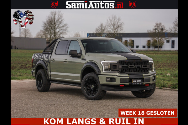 Ford USA F-150 5.0 V8 4X4 | MAT OLIVE GREEN | BIJTELLING VRIJ | ZEER DIK | CAMERA | 3500KG | PANORAMA | LEDER | GO RHINO ROLLBAR | CRUISE CONTROL | PRINS LPG | BAKFLIP COVER | Deze pick-up is leverbaar met zowel een groot rijbewijs (C) als een klein rijbewijs (B). Laat ons weten wat jouw voorkeur is.