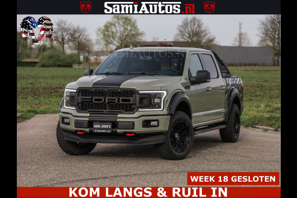 Ford USA F-150 5.0 V8 4X4 | MAT OLIVE GREEN | BIJTELLING VRIJ | ZEER DIK | CAMERA | 3500KG | PANORAMA | LEDER | GO RHINO ROLLBAR | CRUISE CONTROL | PRINS LPG | BAKFLIP COVER | Deze pick-up is leverbaar met zowel een groot rijbewijs (C) als een klein rijbewijs (B). Laat ons weten wat jouw voorkeur is.