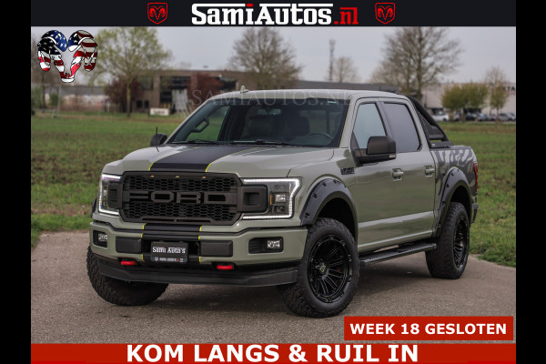 Ford USA F-150 5.0 V8 4X4 | MAT OLIVE GREEN | BIJTELLING VRIJ | ZEER DIK | CAMERA | 3500KG | PANORAMA | LEDER | GO RHINO ROLLBAR | CRUISE CONTROL | PRINS LPG | BAKFLIP COVER | Deze pick-up is leverbaar met zowel een groot rijbewijs (C) als een klein rijbewijs (B). Laat ons weten wat jouw voorkeur is.