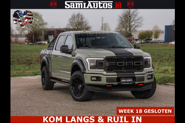 Ford USA F-150 5.0 V8 4X4 | MAT OLIVE GREEN | BIJTELLING VRIJ | ZEER DIK | CAMERA | 3500KG | PANORAMA | LEDER | GO RHINO ROLLBAR | CRUISE CONTROL | PRINS LPG | BAKFLIP COVER | Deze pick-up is leverbaar met zowel een groot rijbewijs (C) als een klein rijbewijs (B). Laat ons weten wat jouw voorkeur is.