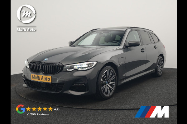 BMW 3 Serie Touring 330e M Sport 293pk Dealer O.H. Dravitgrau | Panodak | Adaptive Cruise | Camera | Lederen Sportstoelen Memory & Verwarmd | Sfeerverlichting | Stuur Verwarmd | Hifi Audio | Blis | Keyless | Apple Carplay | Plug In Hybrid |