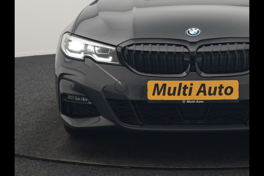 BMW 3 Serie Touring 330e M Sport 293pk Dealer O.H. Dravitgrau | Panodak | Adaptive Cruise | Camera | Lederen Sportstoelen Memory & Verwarmd | Sfeerverlichting | Stuur Verwarmd | Hifi Audio | Blis | Keyless | Apple Carplay | Plug In Hybrid |